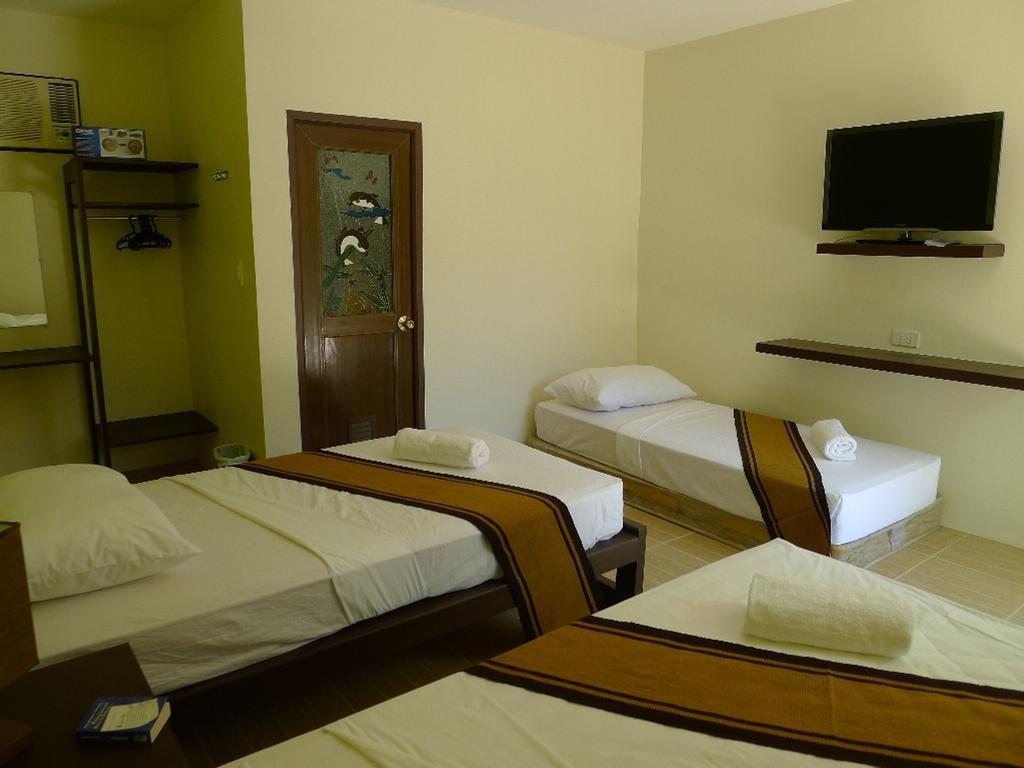 By The Bay, Jacana Bed & Breakfast Puerto Princesa Номер фото